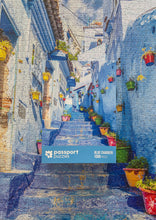 Load image into Gallery viewer, Passport Puzzles 1000 piece jigsaw puzzle Blue Chaouen