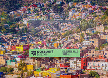 Load image into Gallery viewer, Passport Puzzles 1000 piece jigsaw puzzle Colourful Hills