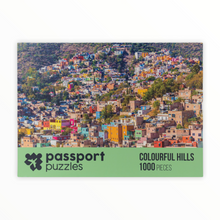 Load image into Gallery viewer, Passport Puzzles 1000 piece jigsaw puzzle Colourful Hills