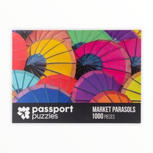 Load image into Gallery viewer, Passport Puzzles 1000 piece jigsaw puzzle Market Parasols