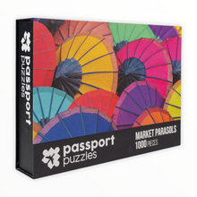 Load image into Gallery viewer, Passport Puzzles 1000 piece jigsaw puzzle Market Parasols
